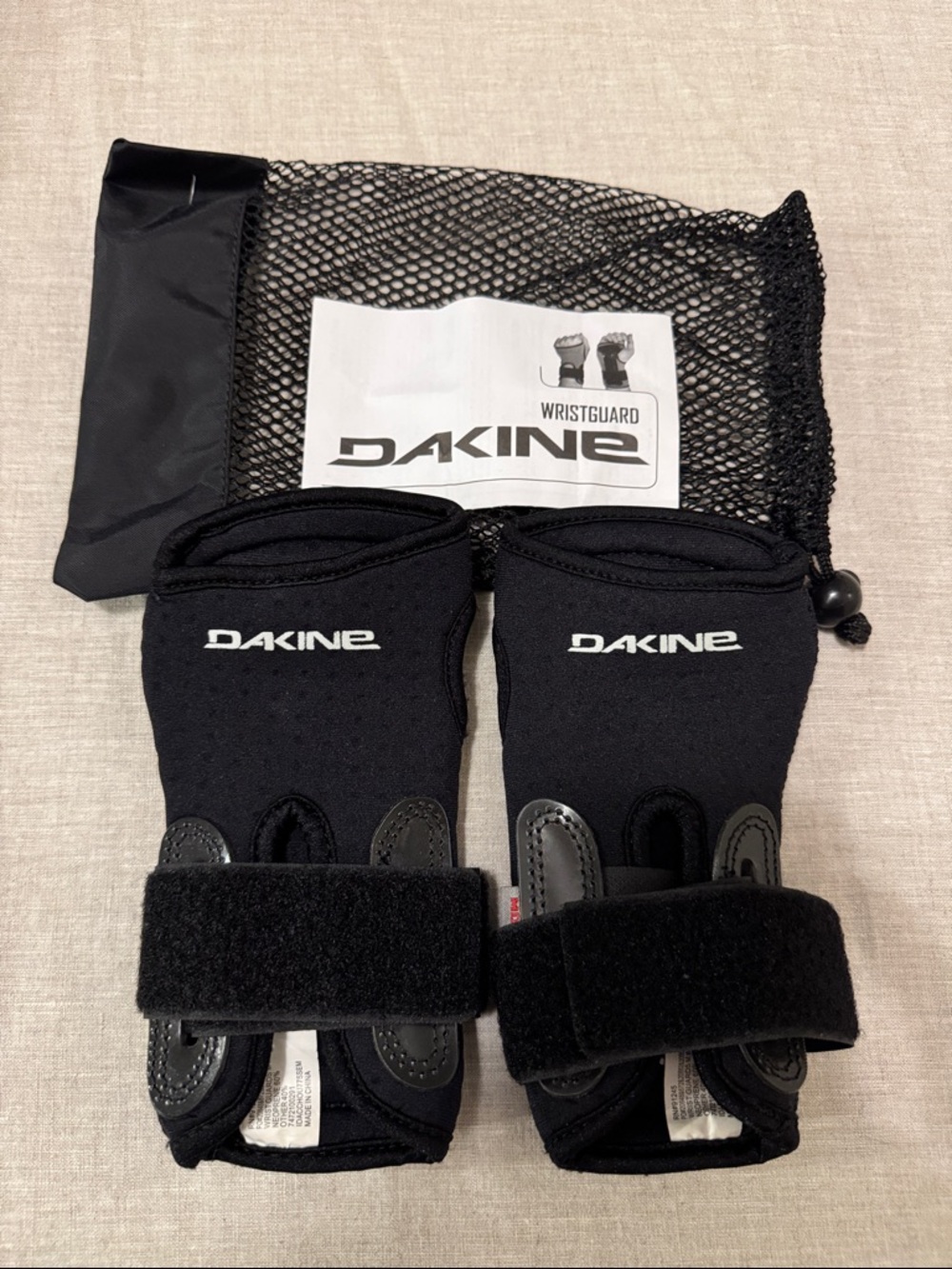 Dakine Black Wrist Guards with Mesh Storage Bag